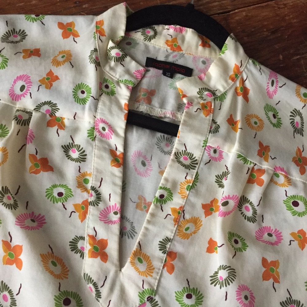 Abstract Floral collarless short sleeved Blouse